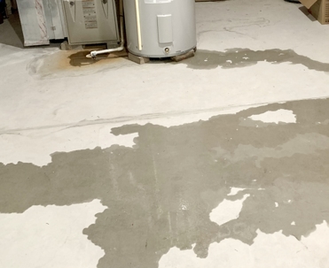 Water leak on basement floor.
