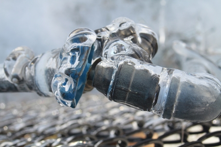 Close-Up Of Frozen Pipe