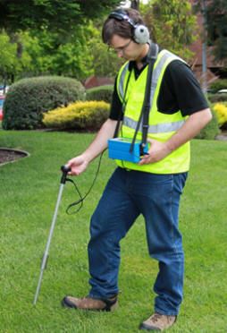 Technician Performing Electronic Leak Detection